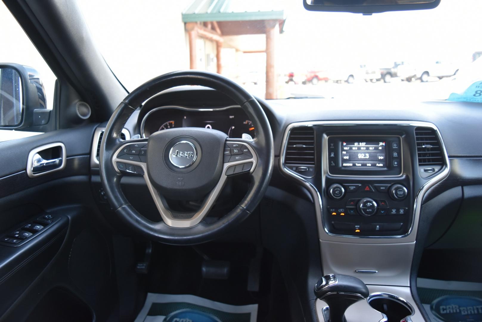 2014 Blue /Black Jeep Grand Cherokee Laredo (1C4RJFAG6EC) with an 3.6L V6 24 Valve VVT engine, 8-Speed Automatic transmission, located at 1600 E Hwy 44, Rapid City, SD, 57703, (605) 716-7878, 44.070232, -103.171410 - Photo#12